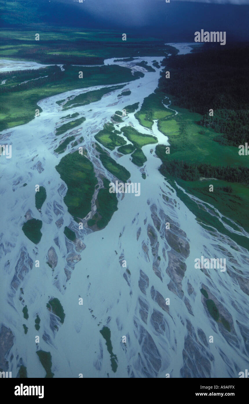 Big river flowing through tidal flats amnd marsh toward Cook Inlet, Lake Clark National park, Alaska Stock Photo