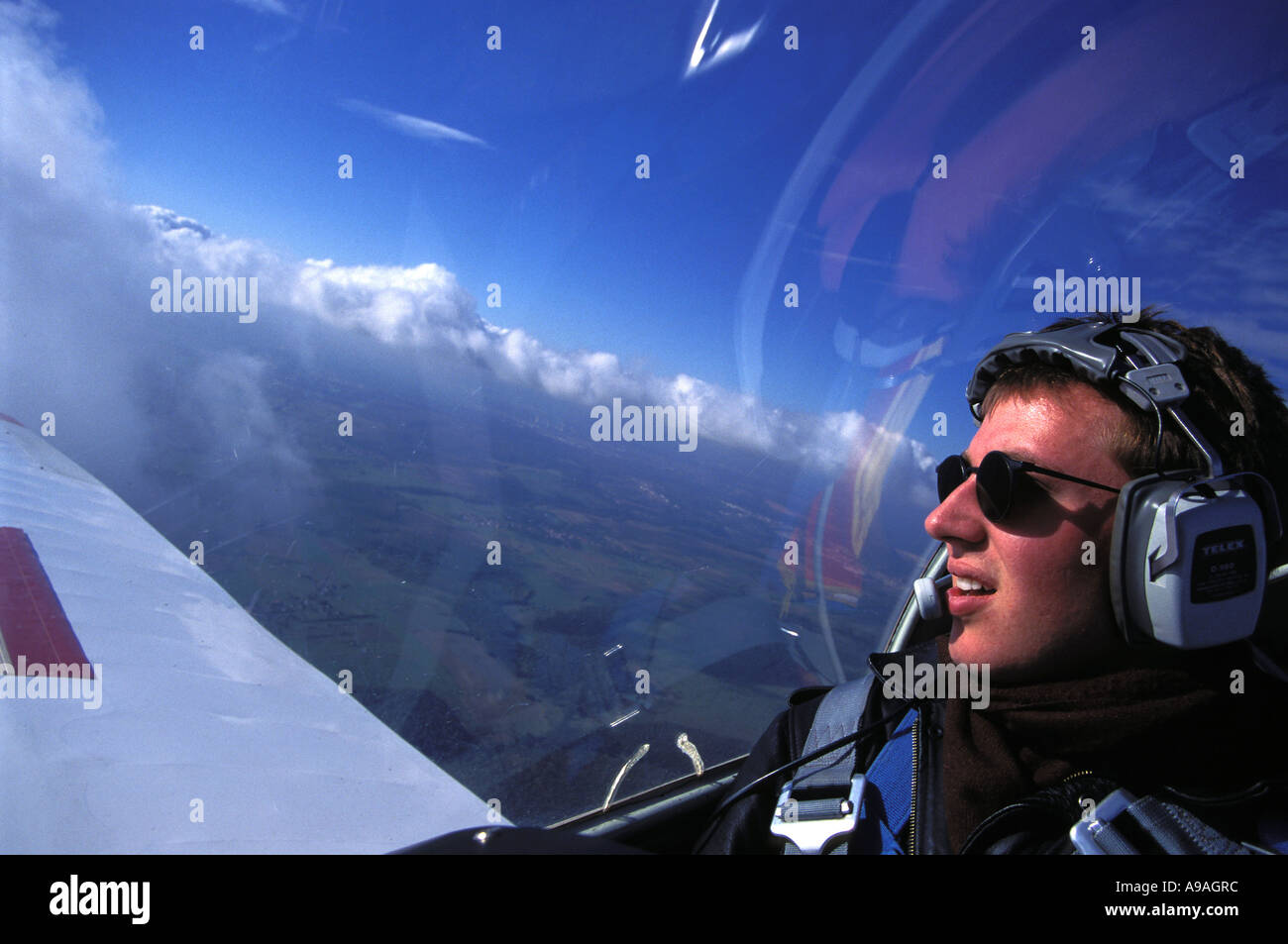 Aerian Leisure Glider Flirt with the Clouds Stock Photo