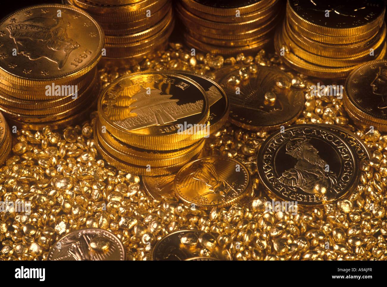 BACKGROUND OF INTERNATIONAL GOLD BULLION COIN STACKS IN GOLD SHOT ...