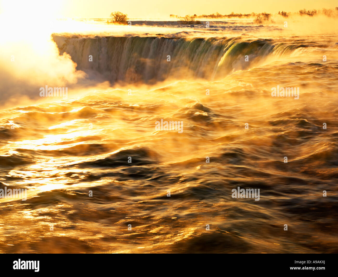 sunrise at Niagara Falls also known as the Canadian Falls and Horseshoe Falls in winter Stock Photo