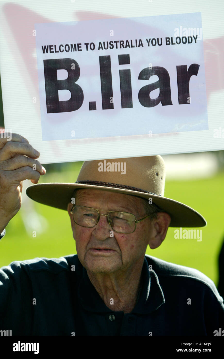 An older Anti War protester during British Prime Minister Tony Blair's visit to Australia in 2006 Stock Photo
