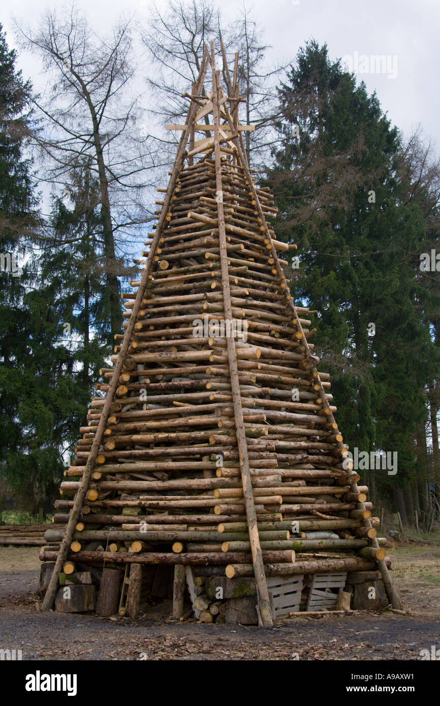 Tower of logs prepared for the Grand Feu in Chantemelle Belgium celebrating the end of winter Stock Photo