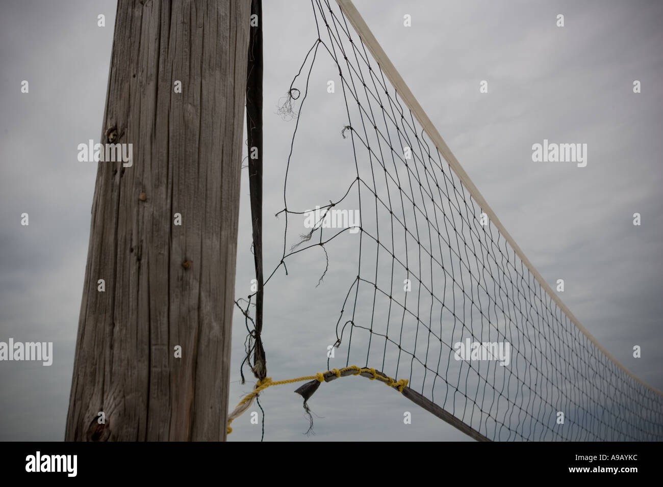 Volleyball net and pole on a beach Stock Photo Alamy