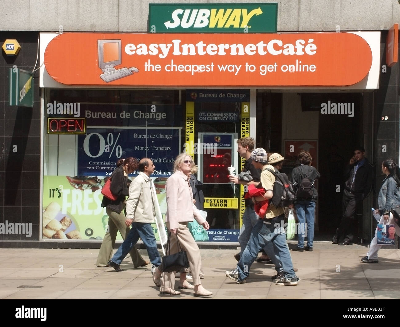Oxford Street London shop front sign of Easy Internet Café sharing premises with Bureau de Change Stock Photo