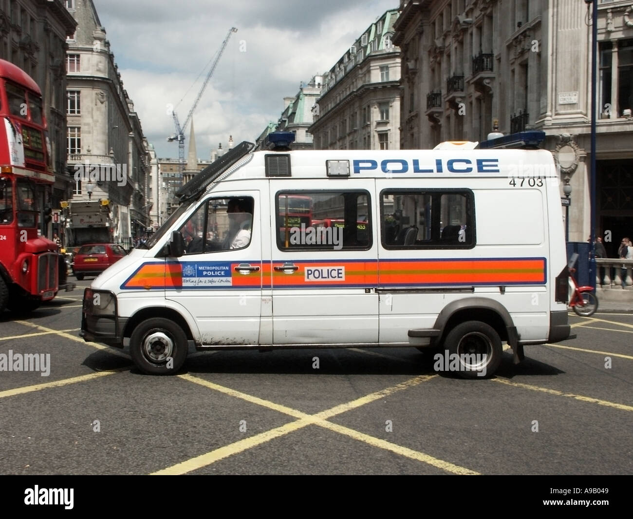 City of Westminster metropolitan police van at speed crossing box junction Oxford  Circus West End London England UK Stock Photo - Alamy