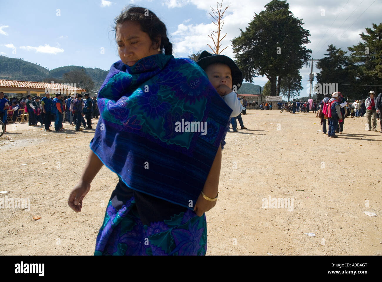 Zinacantan woman has her baby in her back Chiapas Mexico Stock Photo