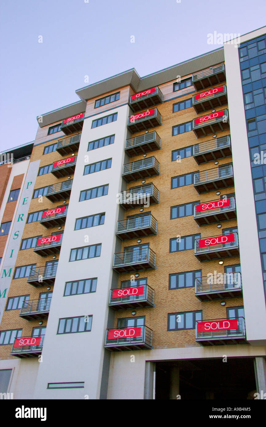 Sold signs on a new development of apartments; Newcastle; UK Stock