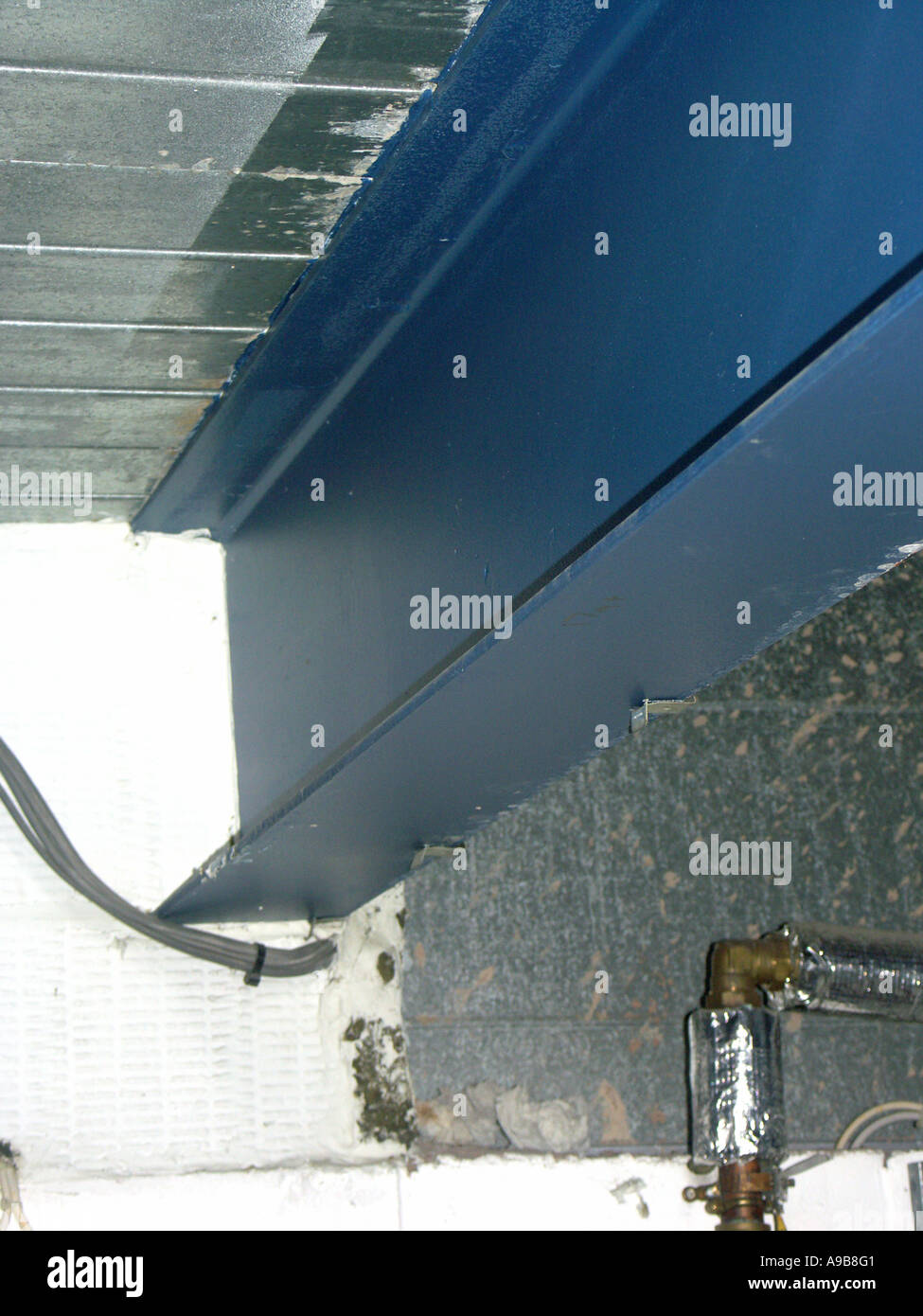 Load bearing RSJ or Rolled Steel Joist shown in situ in a building