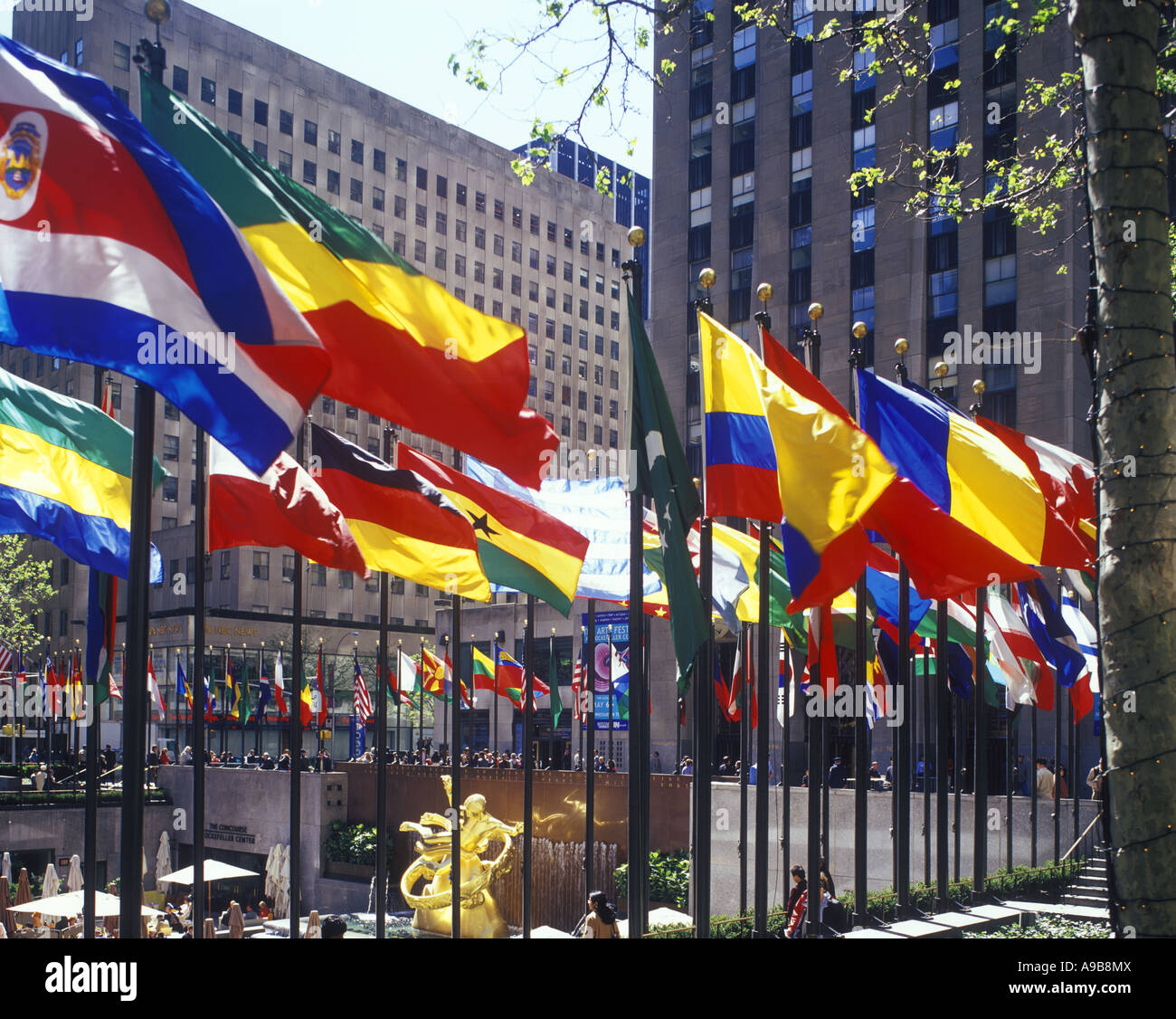 ROW OF NATIONAL FLAGS FLYING ON FLAGPOLES ROCKEFELLER CENTER (©RAYMOND ...