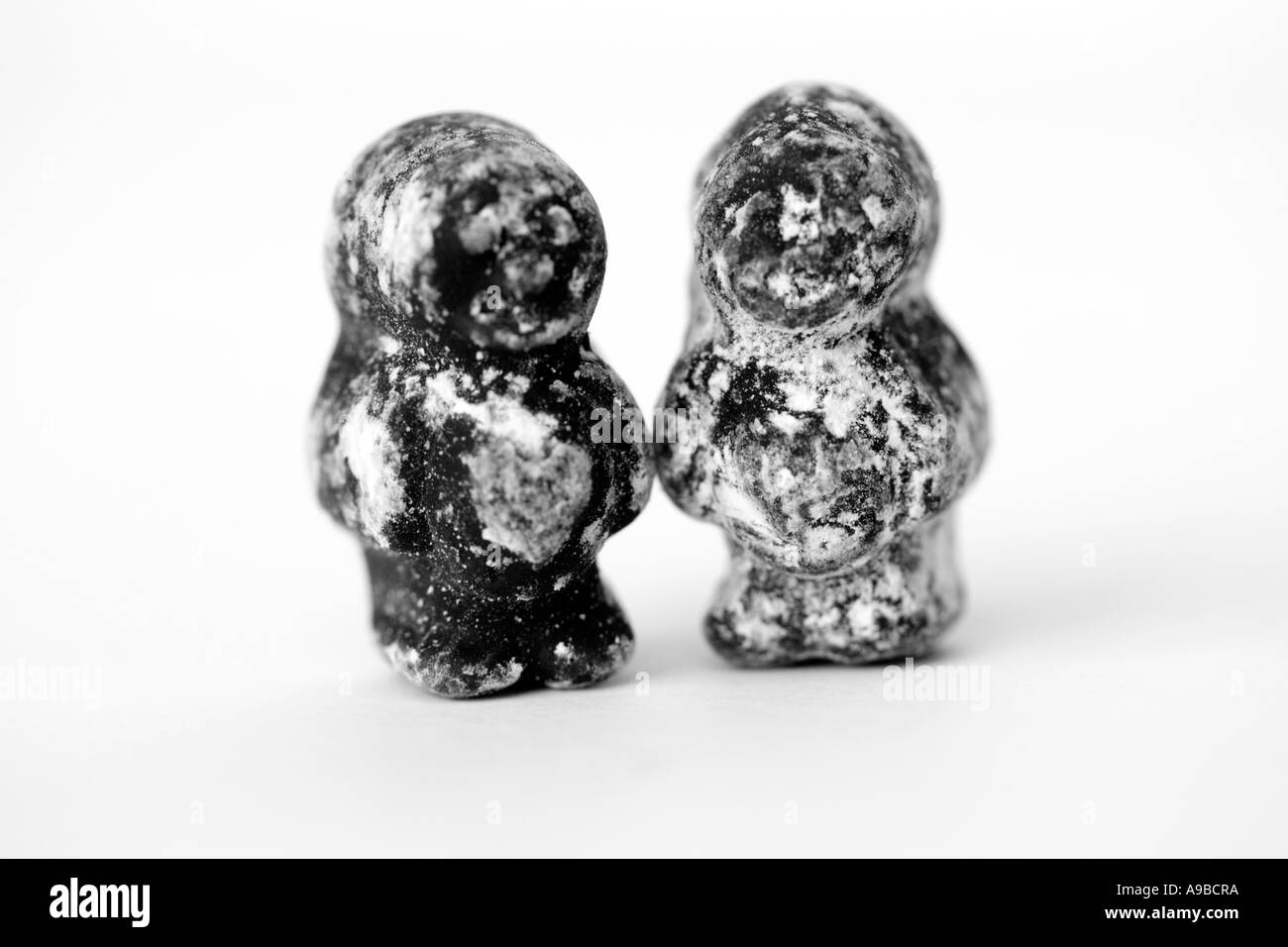 Two black jelly babies Stock Photo