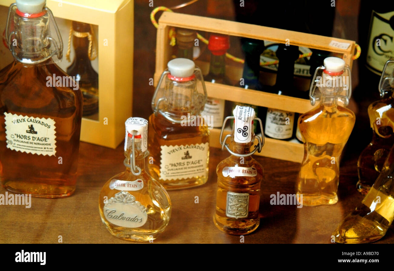 france normandy calvados bayeux old town shops restaurants and half timbered buildings in the old town display of calvados brand Stock Photo