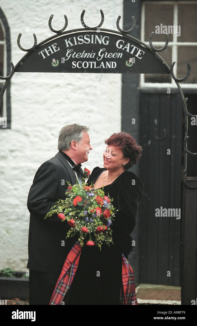 Newlywed Couple Under The Kissing Gate After Their Wedding Gretna Green Scotland Stock Photo Alamy