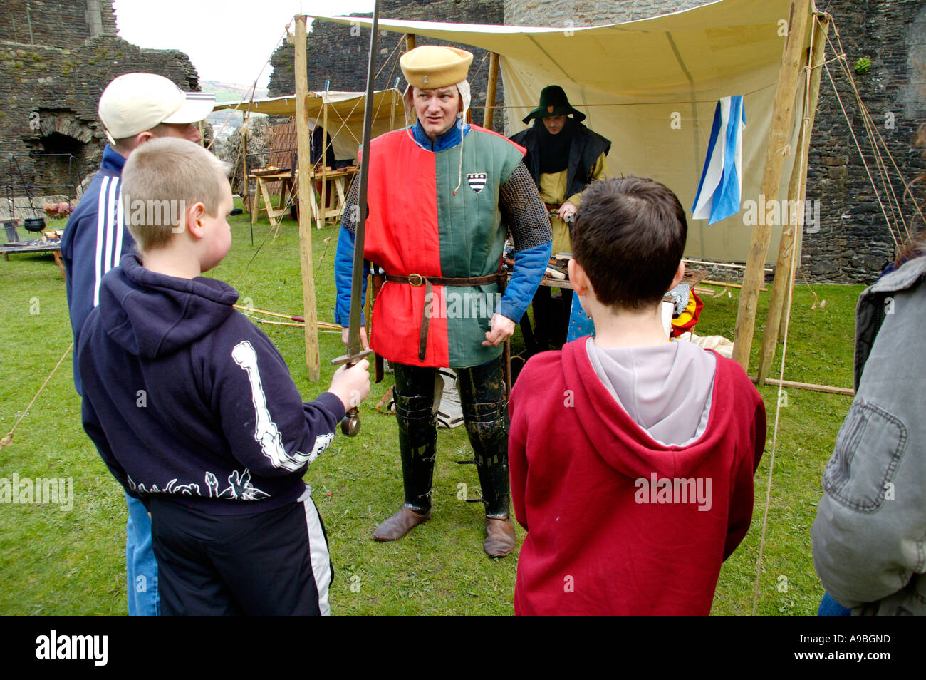 The Company of Chivalry reenactment of medieval life in the year 1370 at Caerphilly Castle South Wales UK Stock Photo