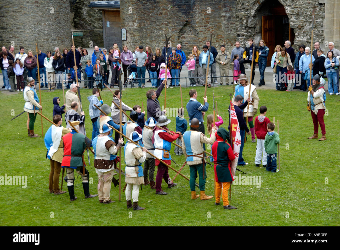 The Company of Chivalry reenactment of medieval life in the year 1370 at Caerphilly Castle South Wales UK Stock Photo