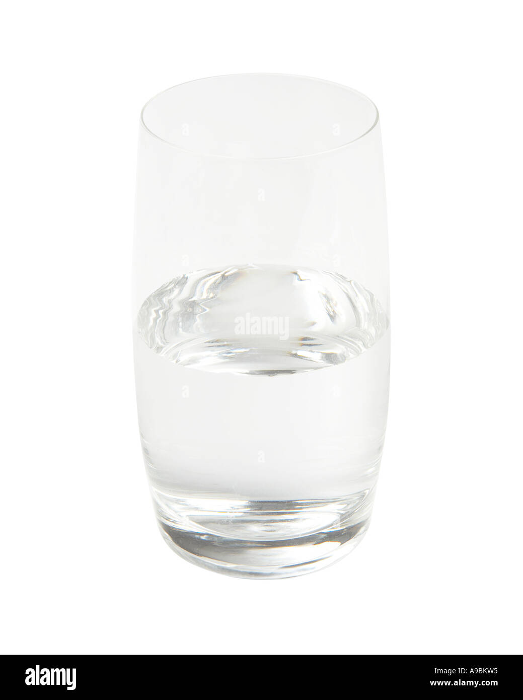 Glass half filled with water on white background with clipping path Stock Photo