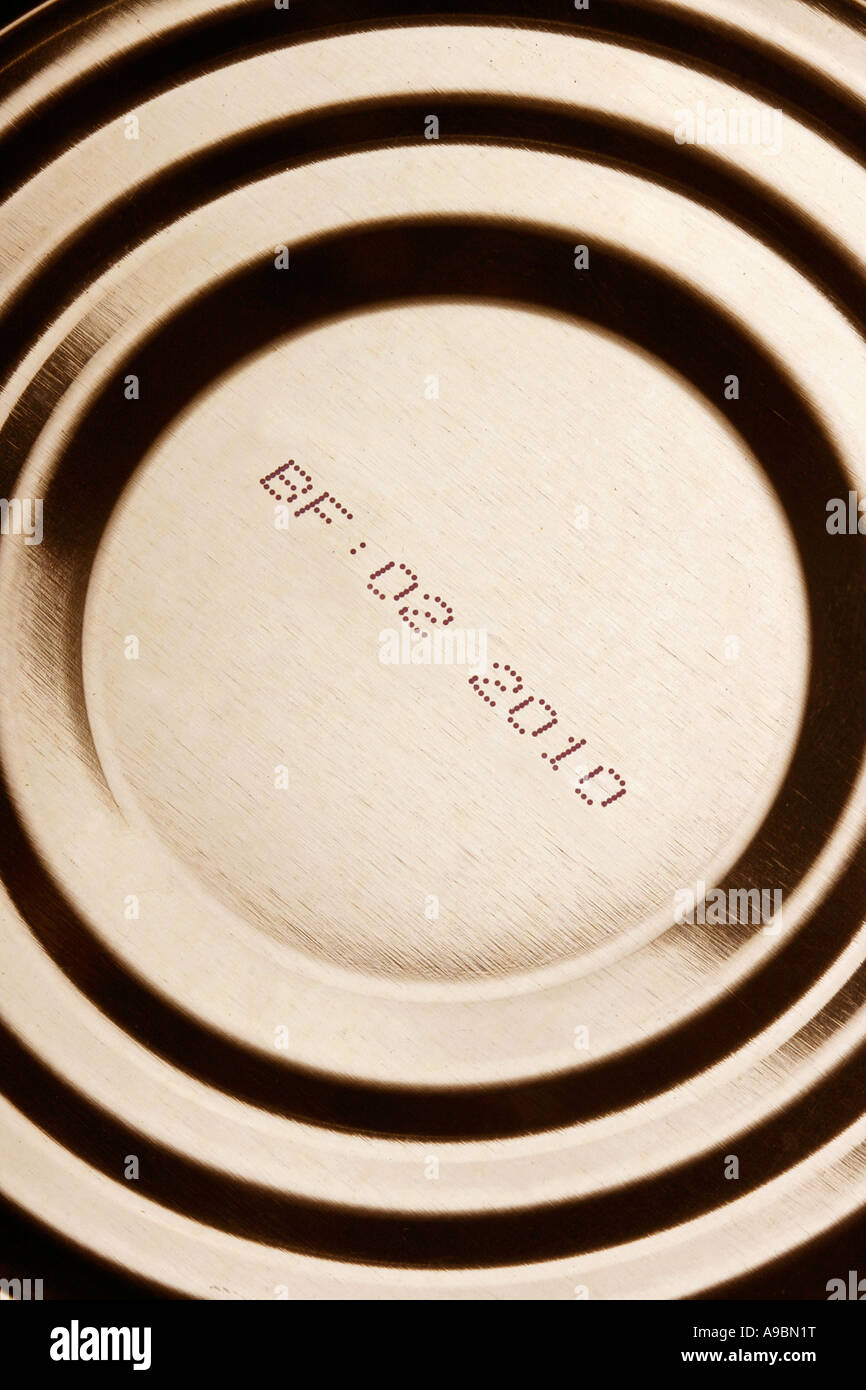 Tin can closeup with expiration date Stock Photo Alamy