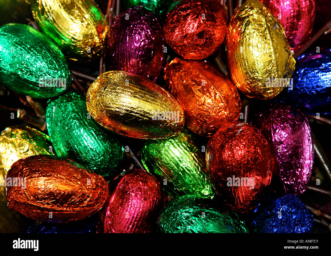 Colorful easter eggs made out of chocolate and wrapped in aluminium Stock Photo