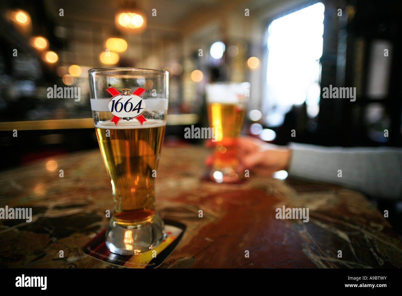 Pint of Kronenbourg 1664 lager in bar Stock Photo - Alamy