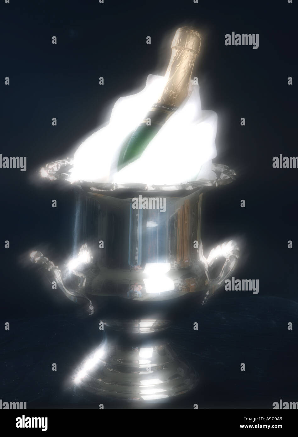 champagne bucket with bottle of champagne on ice abstract soft focus Stock Photo