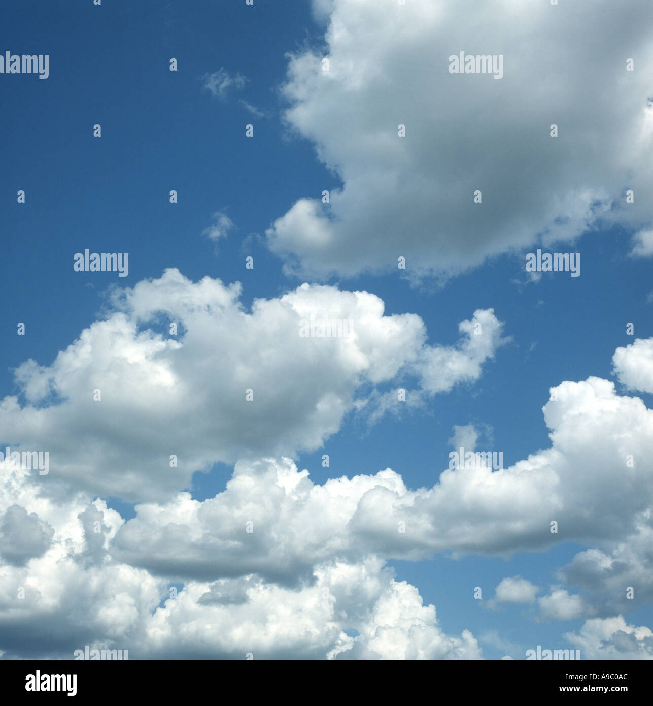cumulus clouds with blue sky and sunshine Stock Photo