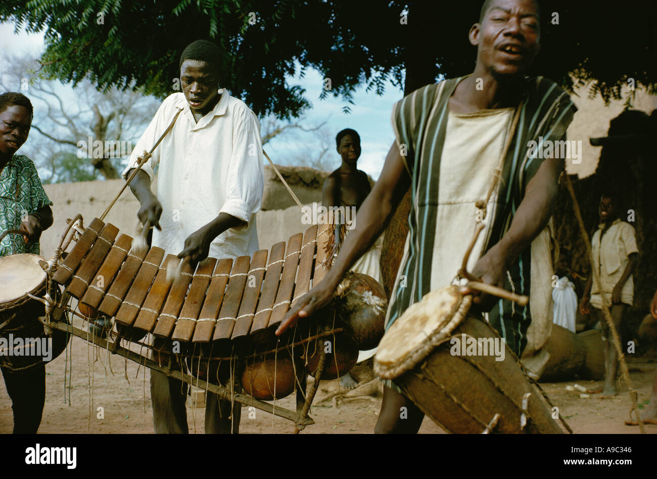Musicians of Bobo tribe playing drums and balafon xylophone in Koumbia Burkina Faso Africa Stock Photo