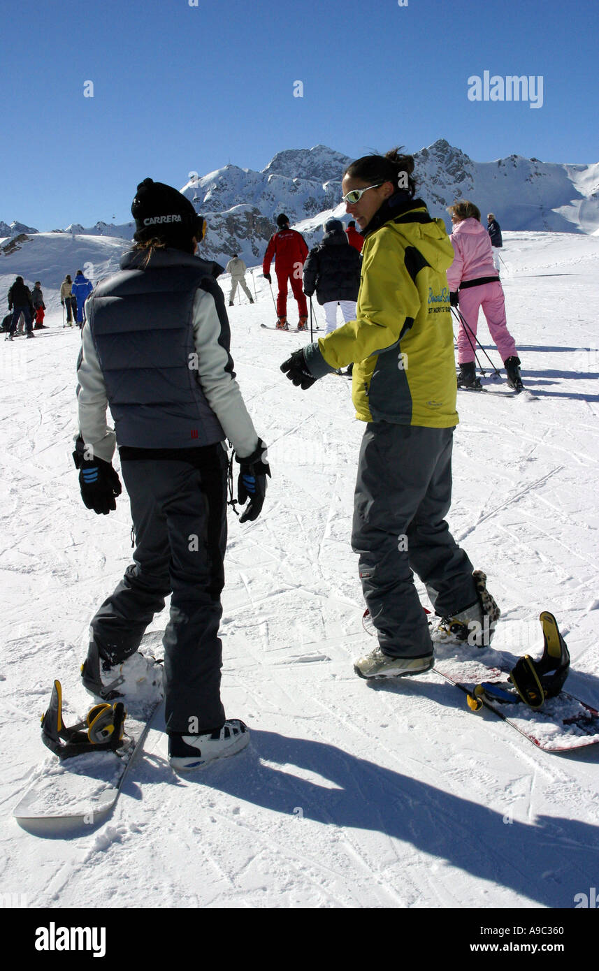snowboard instructor and pupil on the slopes St Moritz Switzerland Stock Photo