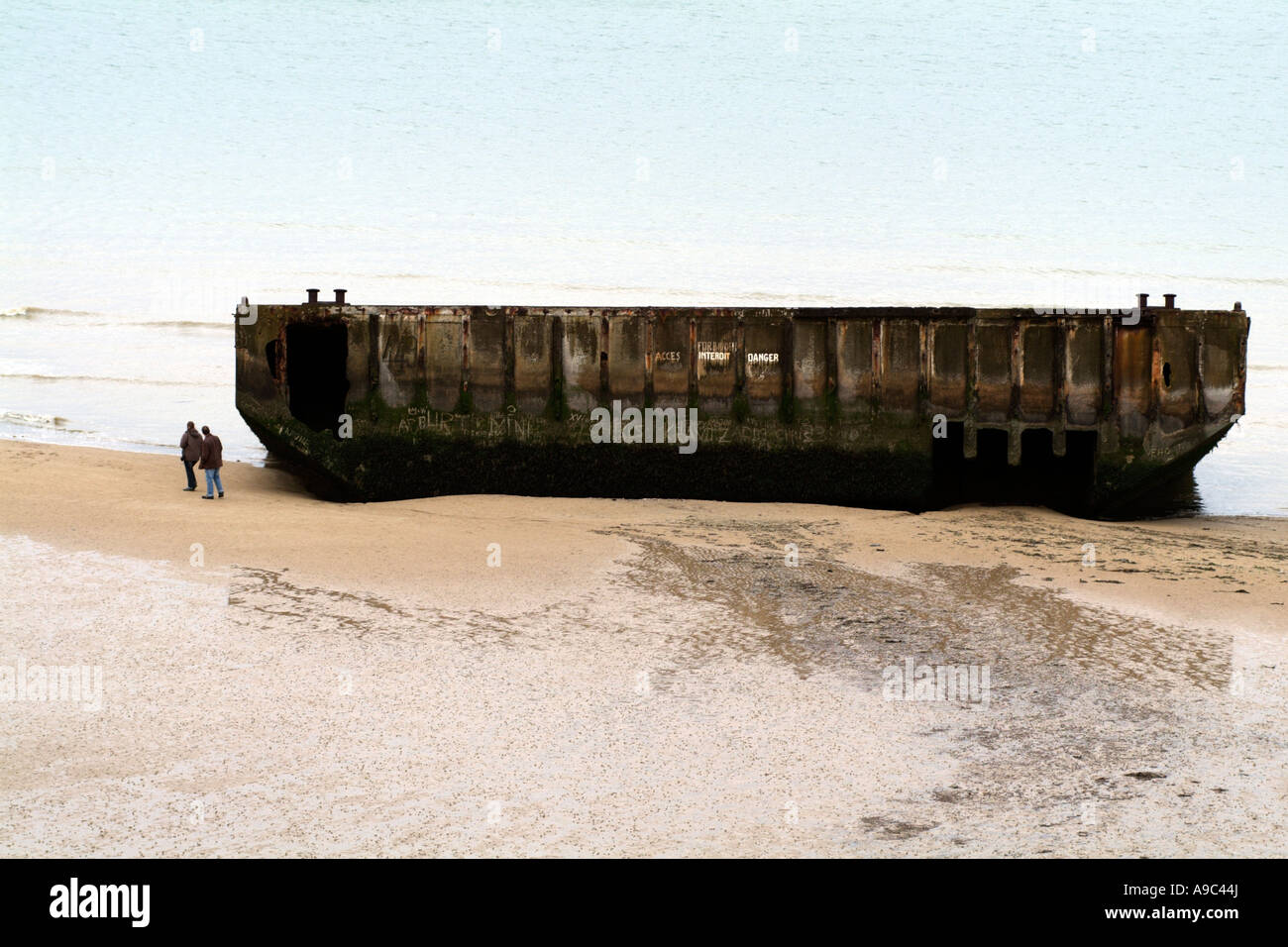 Arromanches Normany France Remains of Mulberry Harbour on Gold Beach Stock Photo