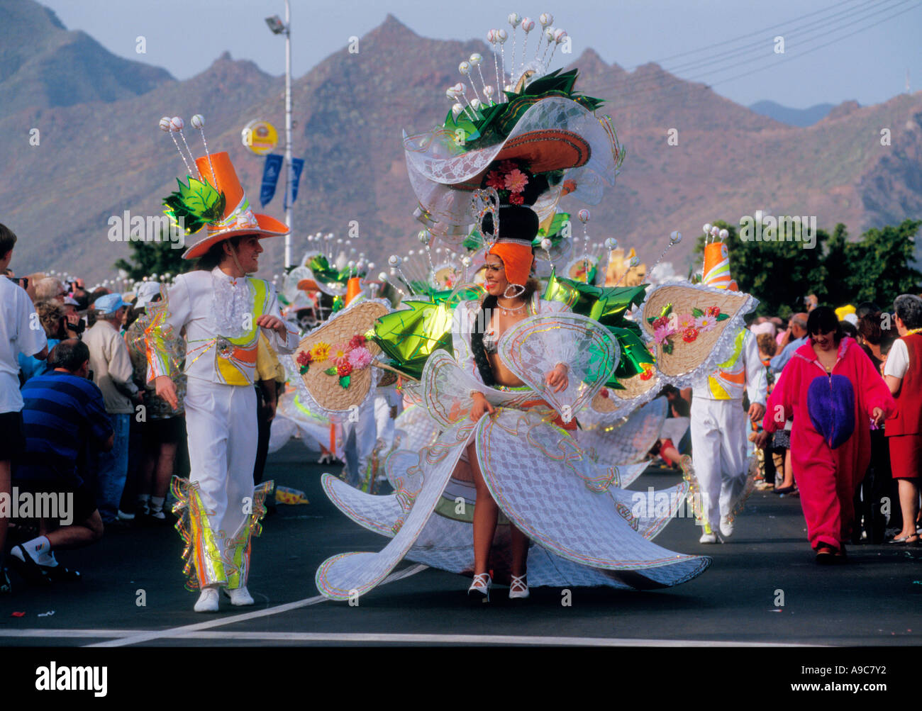 Spain Canary islands Tenerife island Santa Cruz Carnival festival with colorful costume procession on the street Stock Photo