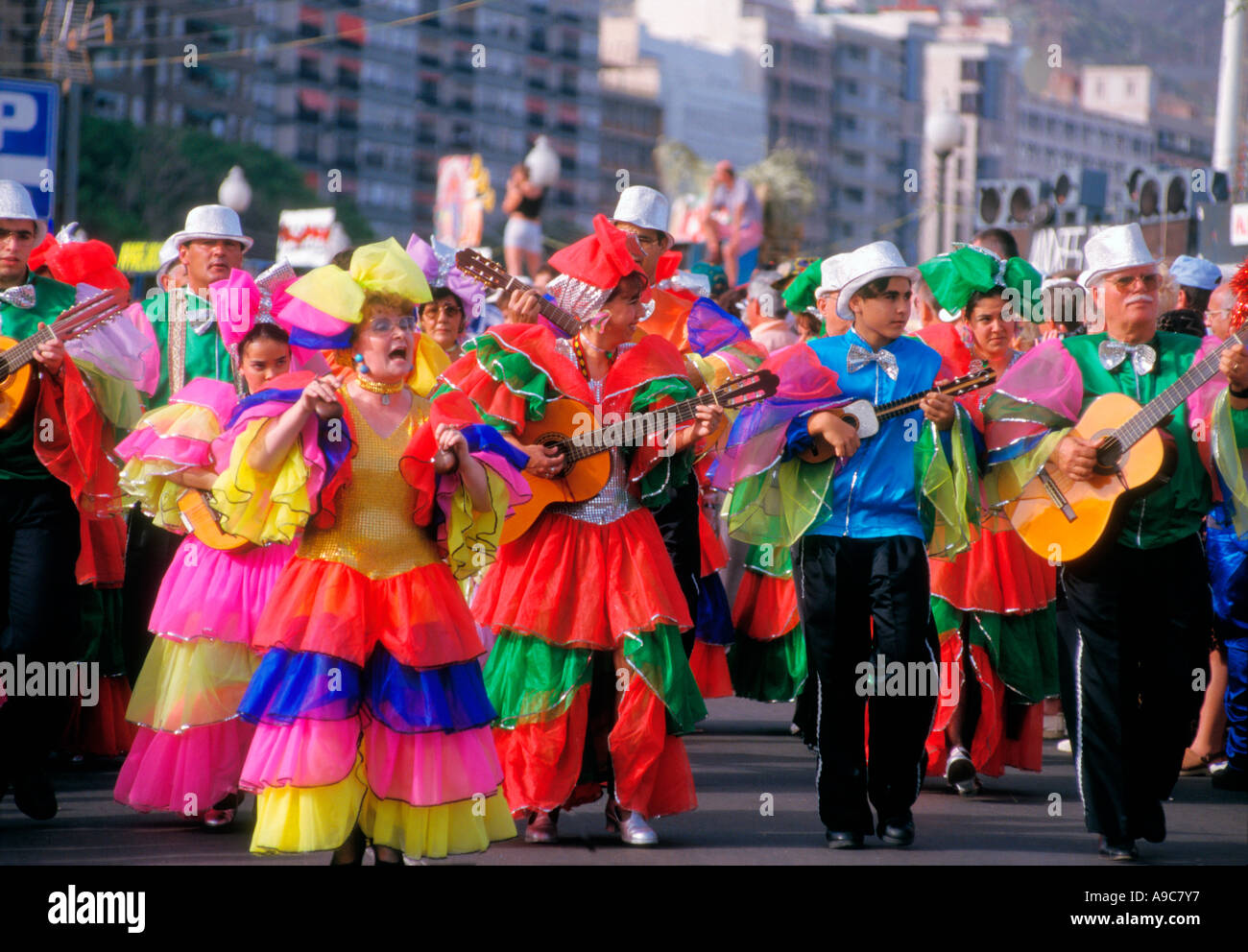 Spain Canary islands Tenerife island Santa Cruz Carnival festival with  colorful costume procession on the street Stock Photo - Alamy