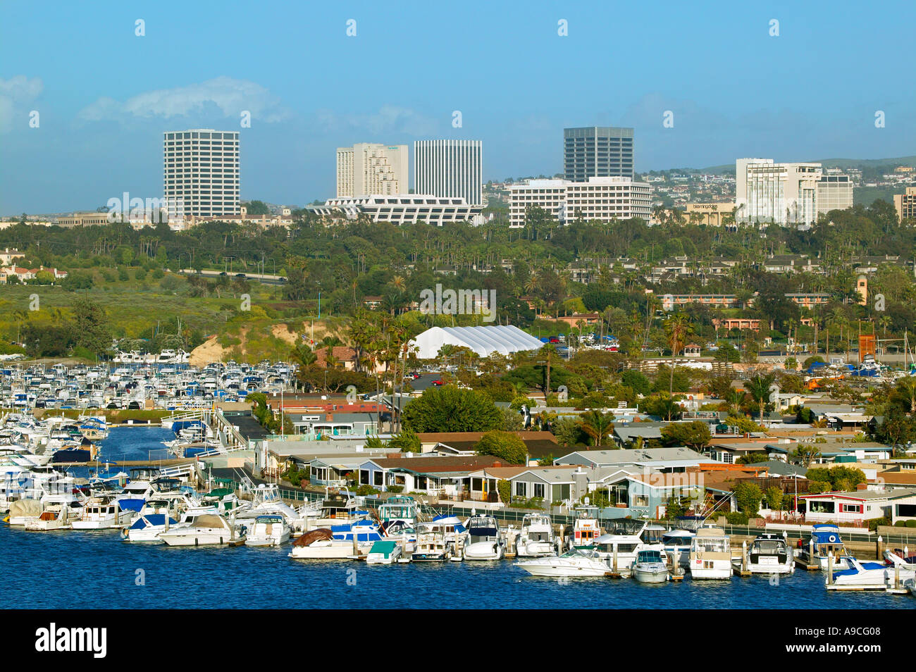 Boats in Newport Harbor Fashion Island in the distance