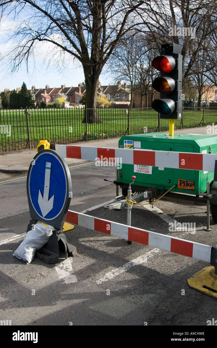 Temporary traffic lights by roadworks Stock Photo - Alamy