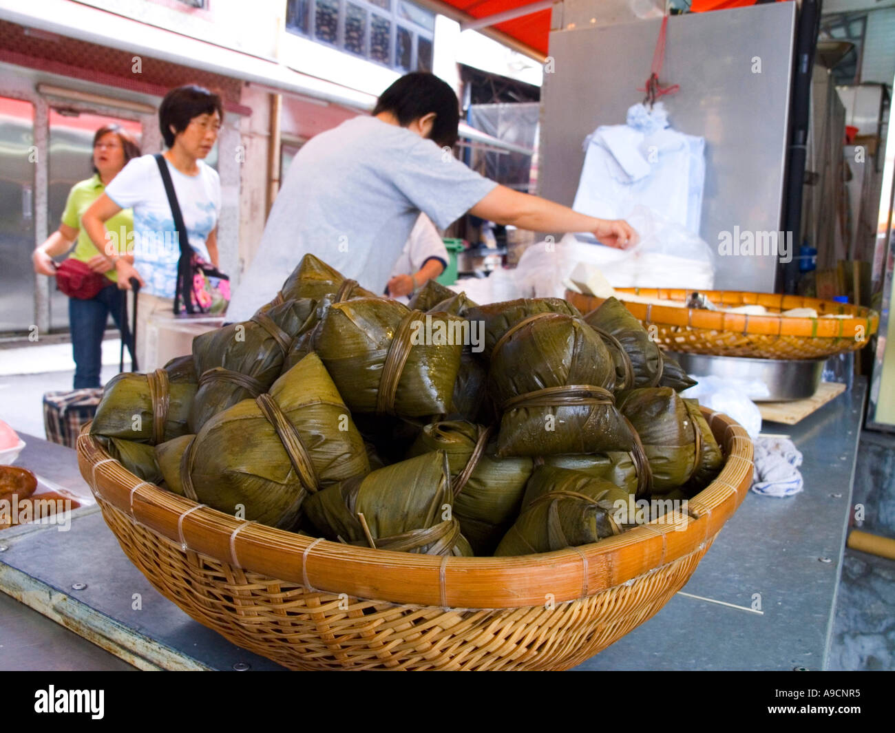 Sticky rice dumpling wrapped in Lily leaves Dragon boat festival hong kong china Stock Photo Alamy
