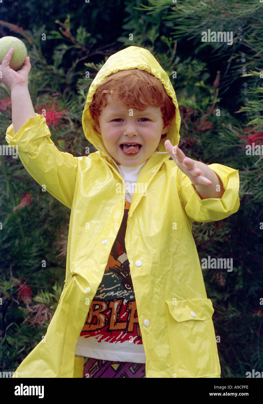 Boy wearing raincoat hi-res stock photography and images - Alamy