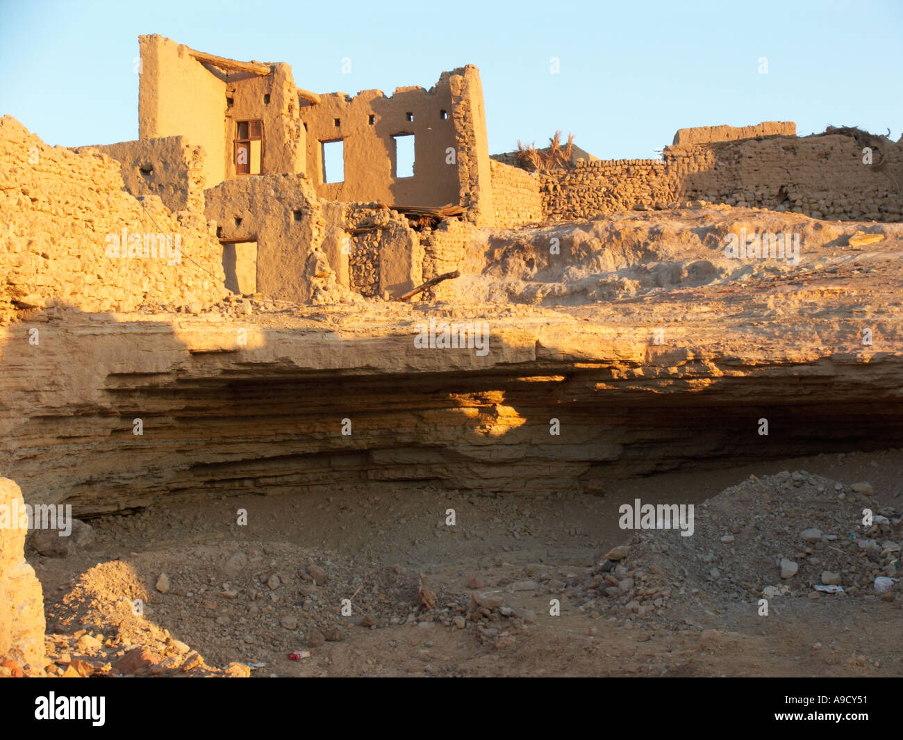 Ancient buildings in El Bawiti constructed largely from mud bricks Stock Photo