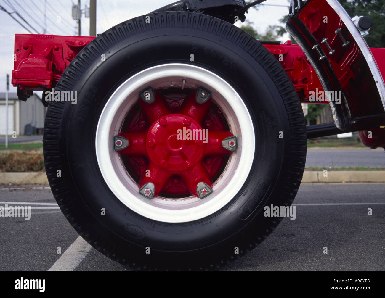 Detail of rear wheel and hub on a restored classic Mack truck Stock