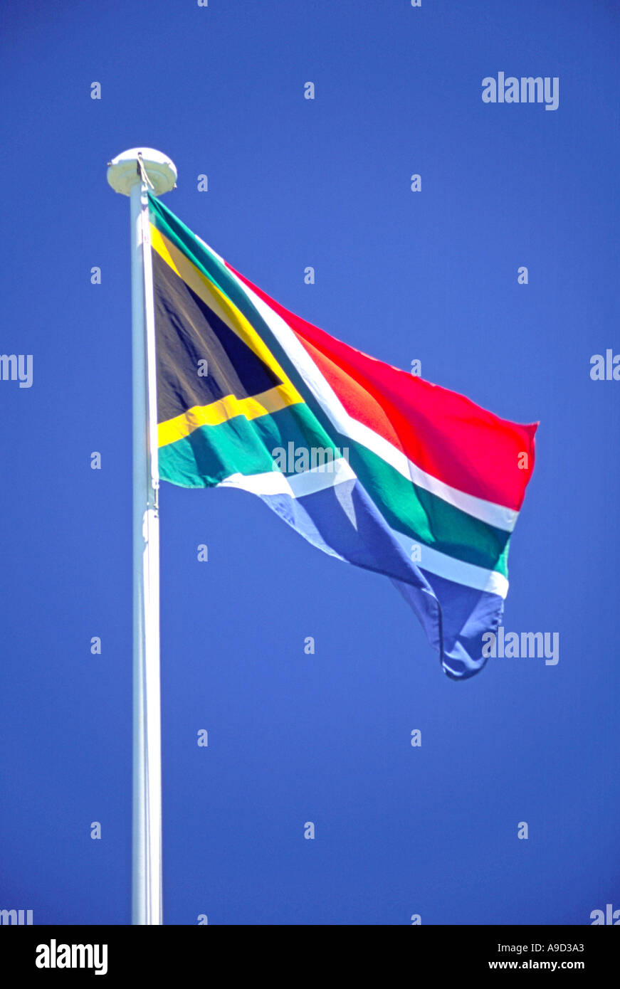 South African flag against a blue sky Stock Photo