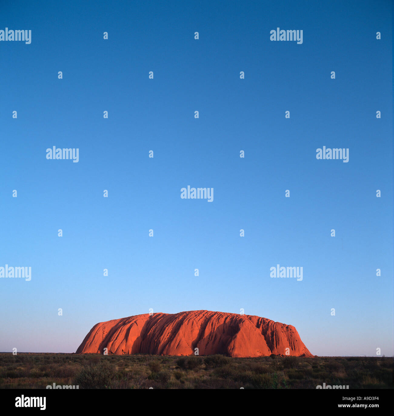 Ayers Rock (Uluru) at sunset, Uluru National Park, Northern Territory, Australia Stock Photo