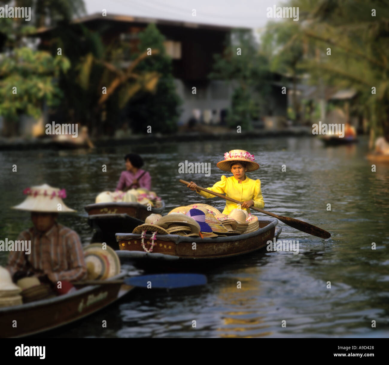 Floating Hat Sellers on a khlong off Chao Phraya River, Bangkok, Thailand, taken in 1990 Stock Photo