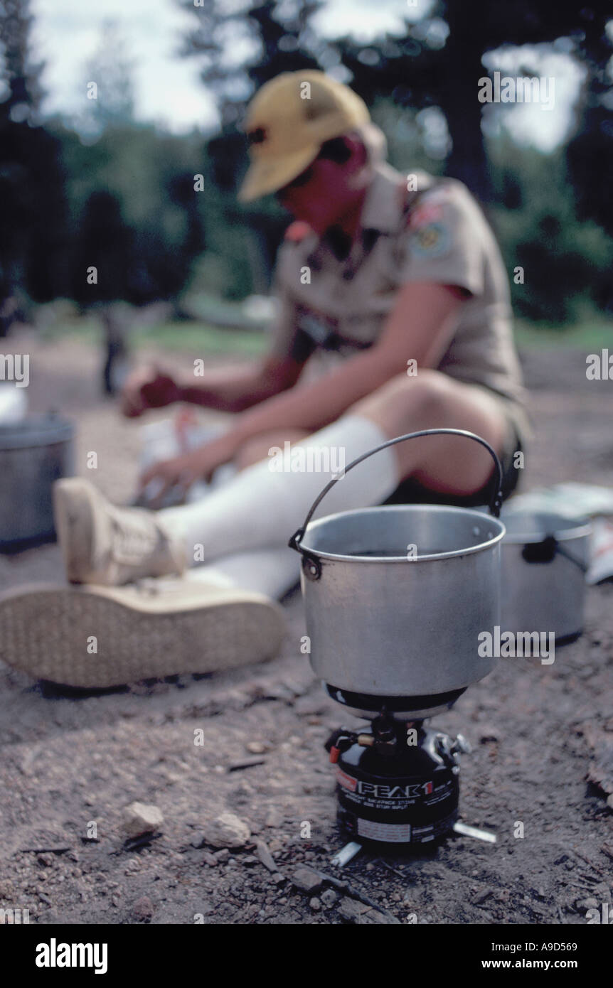 Boy Scout and Coleman camp stove Stock Photo Alamy
