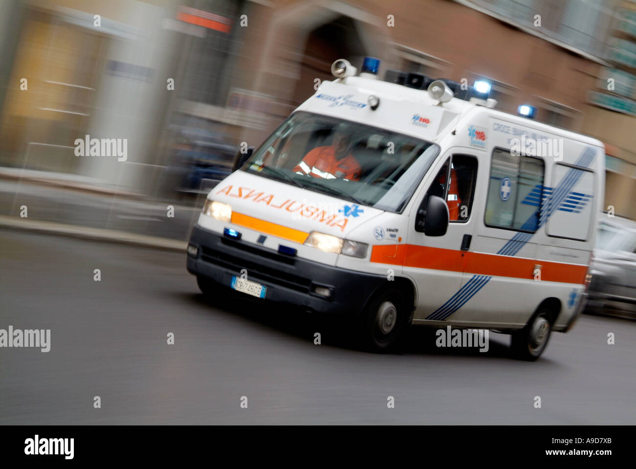 ambulance, ambulanza, Italy, Italian, travelling, at, speed, rush, rushing, to scene, of, an, accident, blue, lights, flashing, Stock Photo