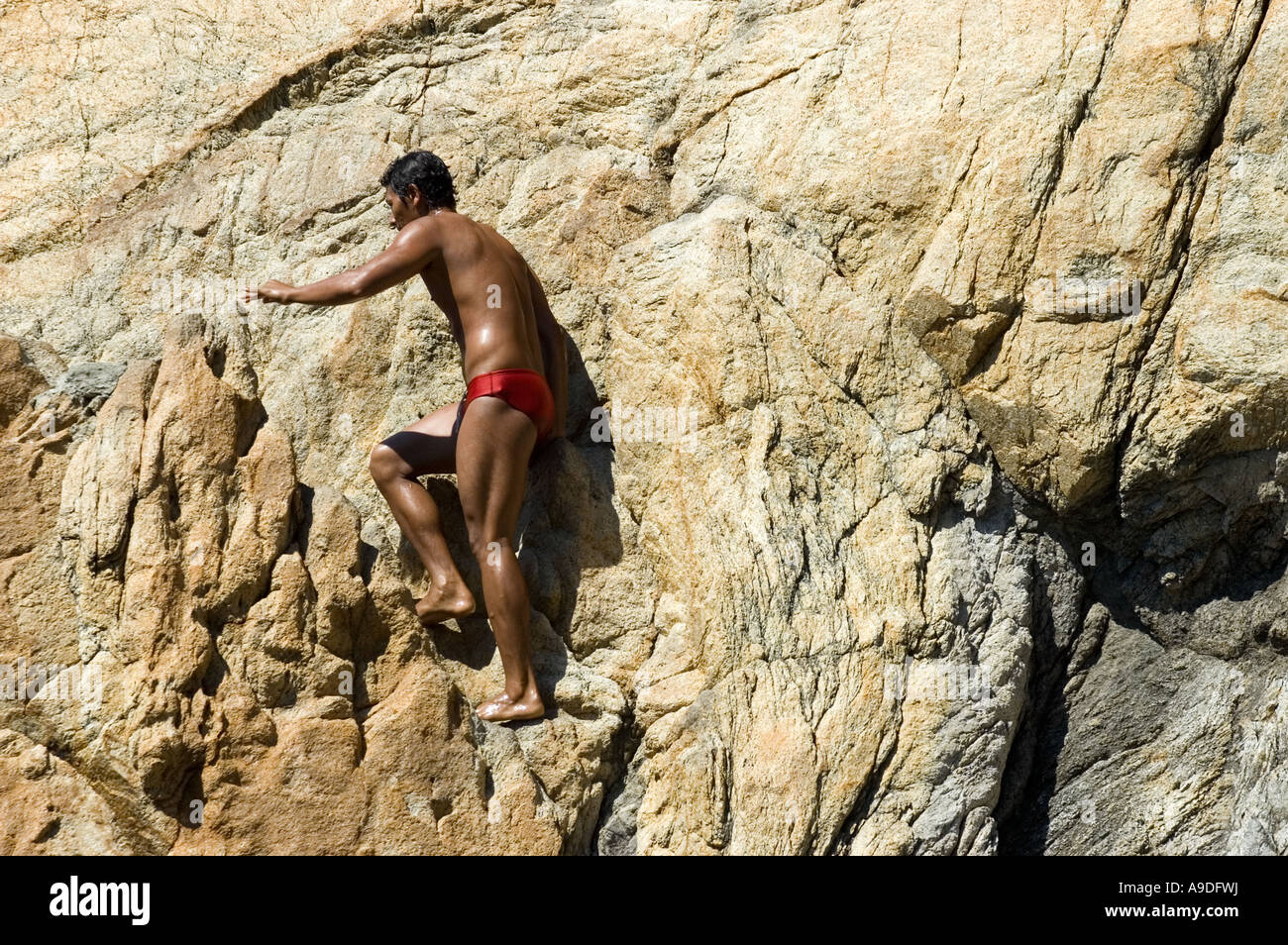 Divers from Quebrada cliffs - Acapulco Stock Photo