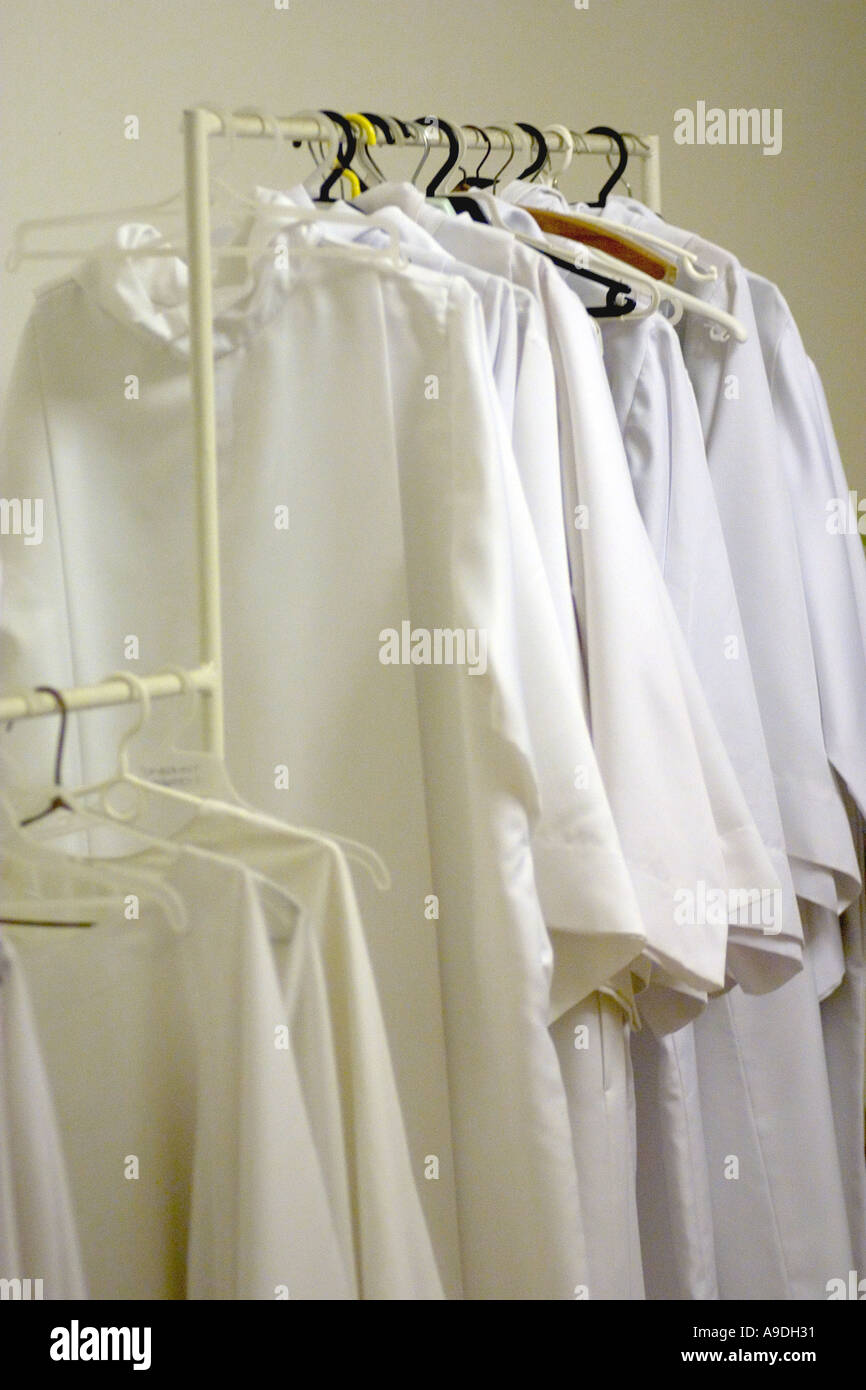 White choir robes hanging in Polish Catholic church. Lodz Poland Stock