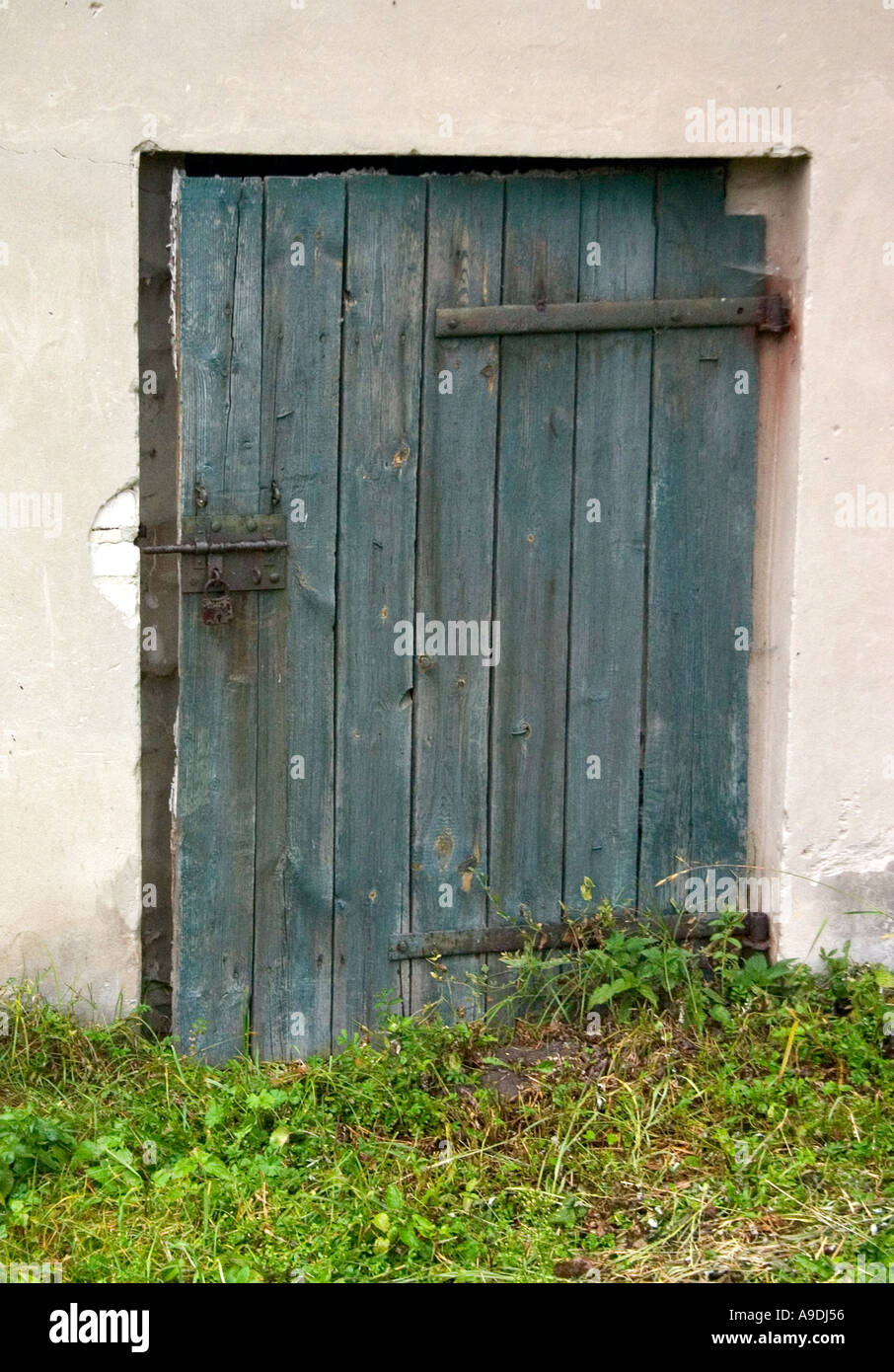 Weathered wooden storage room door. Rawa Mazowiecka Poland Stock Photo