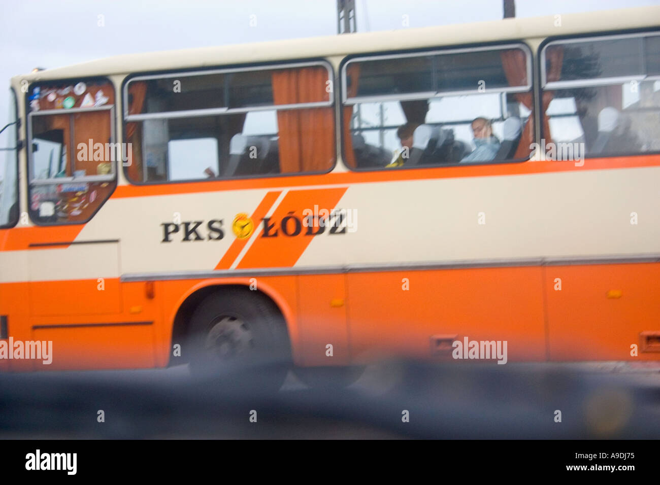 Orange and white passenger bus. Rawa Mazowiecka Poland Stock Photo