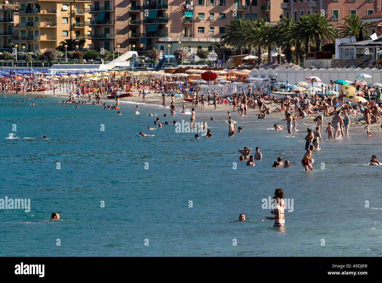 Busy beach in Spotorno Italy Stock Photo