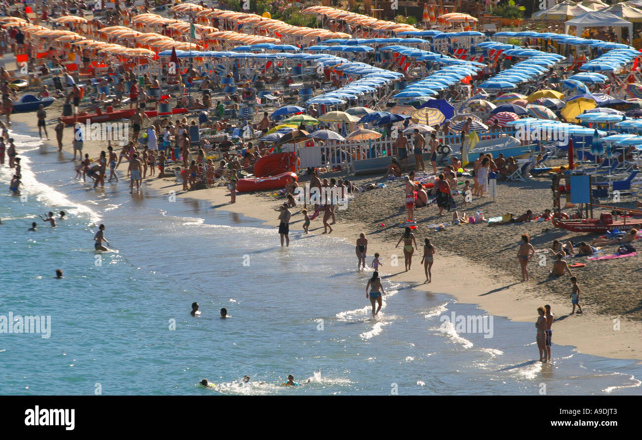 Busy beach in Spotorno Italy Stock Photo