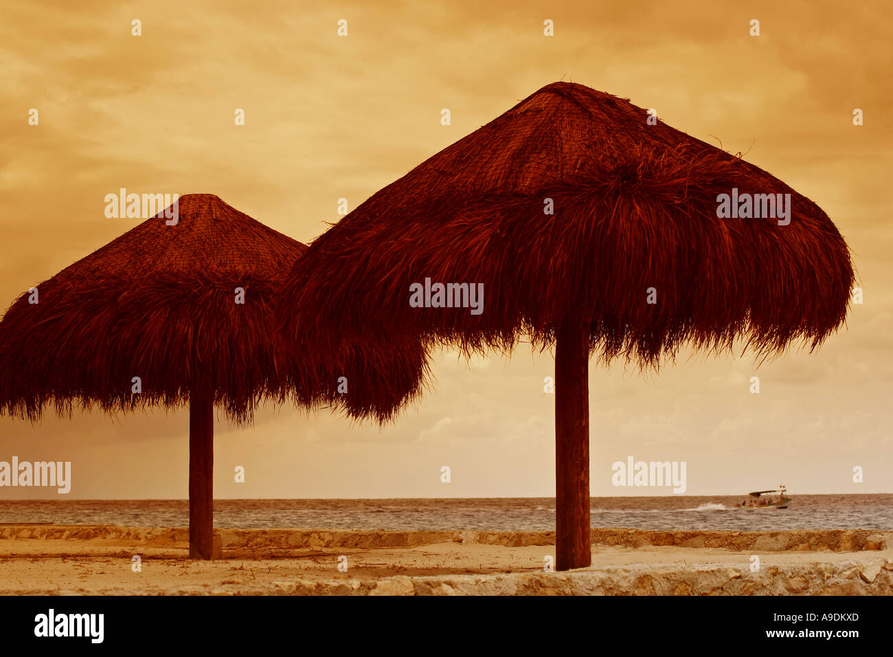 Straw umbrellas on the Caribbean beach, Cozumel, Mexico Stock Photo Alamy