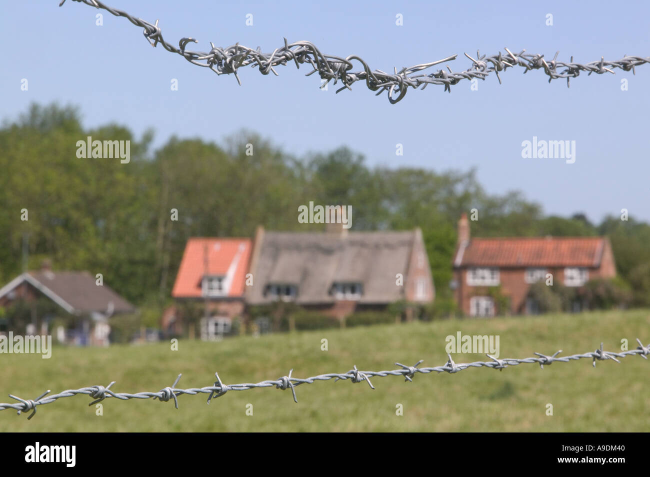 Illegally fenced off common land in Hanworth North Norfolk Stock Photo