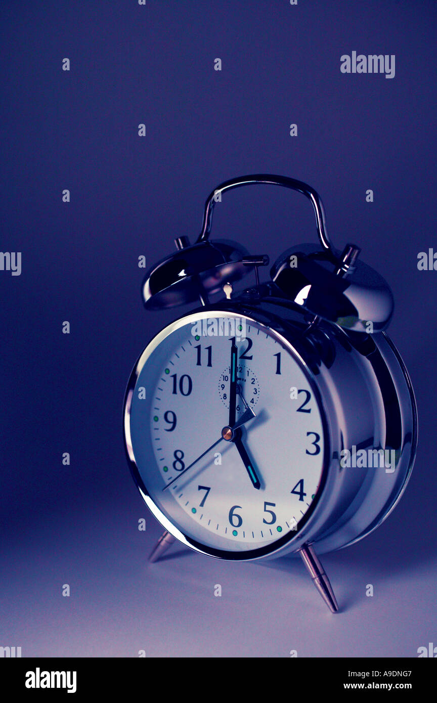 Purple alarm clock Stock Photo Alamy