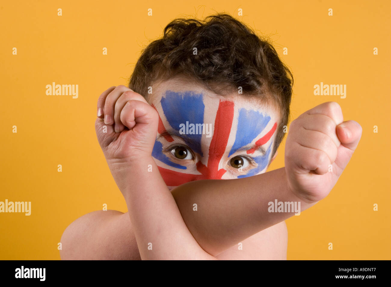 Small boy wearing Union Jack Flag face paint Stock Photo Alamy